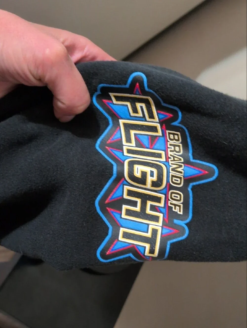 Jordan Black Hooded Sweatshirt with Orange and Blue Logo